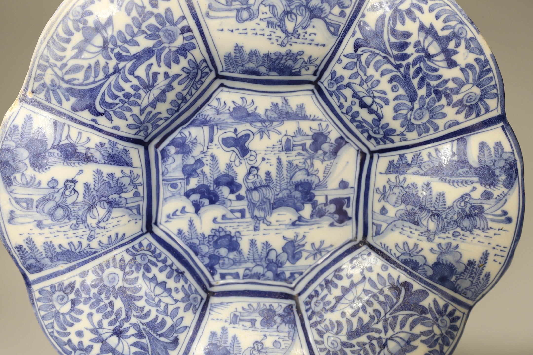 A Delft blue and white chinoiserie lobed dish, c.1700, 35cm diameter